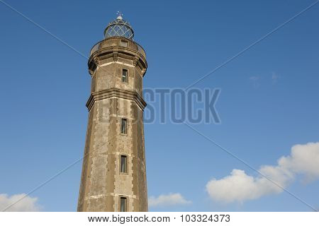 Lighthouse And Sky In Faial Island. Ponta Dos Capelinhos. Azores