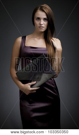 Elegant, Beautiful Woman With Clutch Bag