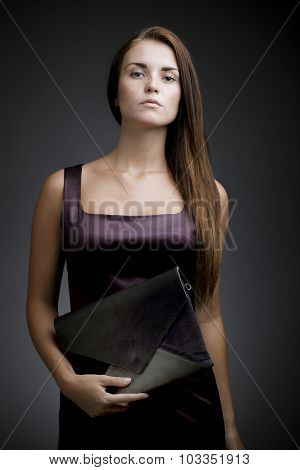 Elegant, Beautiful Woman With Clutch Bag