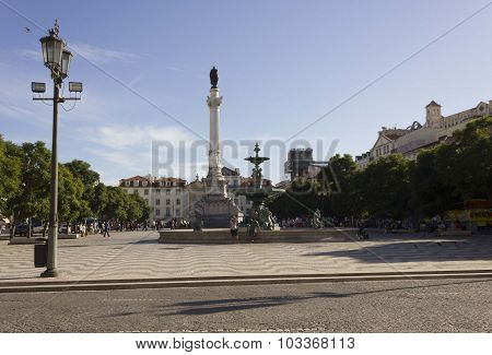 Pedro Iv Column And Fountain In Rossio Square In Lisbon