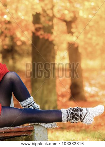 Autumn Fashion. Female Legs In Warm Socks Outdoor