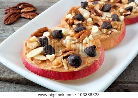 Autumn apple round treats on white serving plate