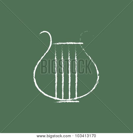 Lyre hand drawn in chalk on a blackboard vector white icon isolated on a green background.