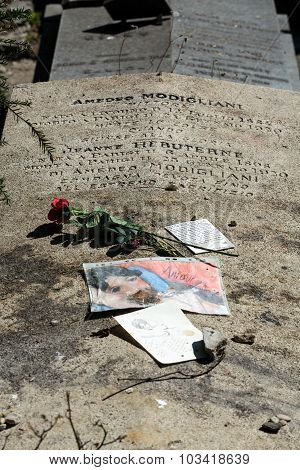 PARIS FRANCE - SEPT 12 2014: Amedeo Modigliani and Jeanne Hebuterne grave in Pere-Lachaise cemetery Paris France