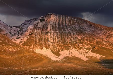 Mountain Rocky Peak At Dramaticl Sunset