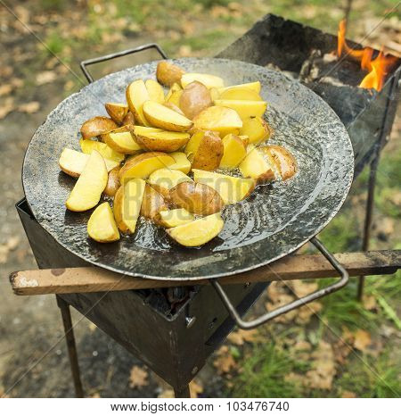 Fried Potato In Big Melal Pot.