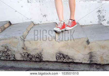 Focus On Girl In Red Shoe