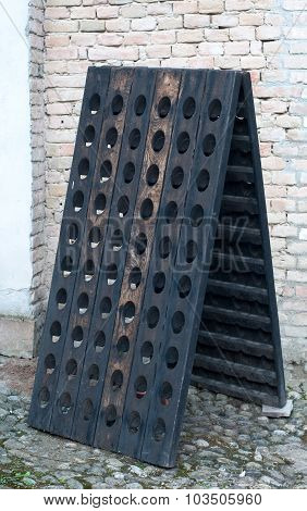 Wooden Device That Serves To Hold The Bottles Of Sparkling Wine , Called In French Pupitres