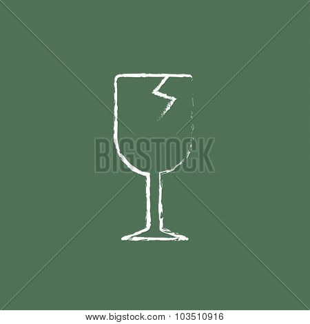 Cracked glass sketch icon hand drawn in chalk on a blackboard vector white icon isolated on a green background.