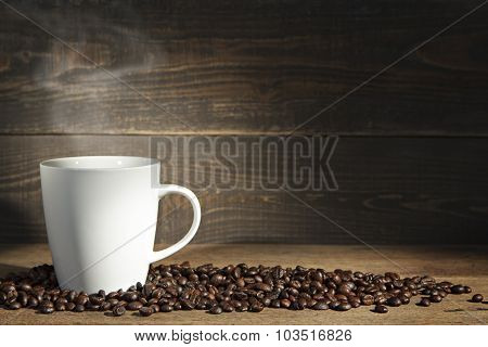 Coffee Cup And Coffee Beans.