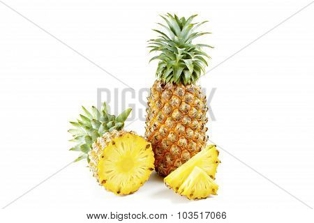 Pineapple With Slices On  White Background.