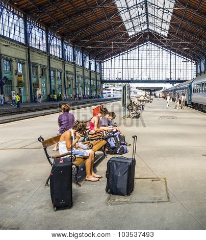 Unidentified People Wait At  The Train Station In Budapest