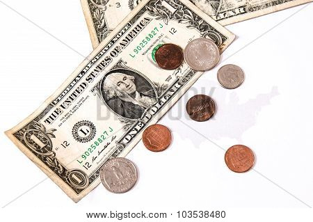 Dollar Bills And Cents Over The United States Map