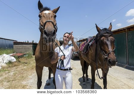 Thessloniki Greece June 14 2015: The ridder and horses before the riding competition with obstacles.