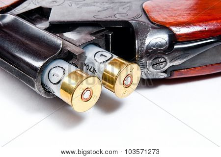 Hunting Shotgun And Ammunition On White Background.