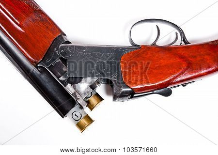 Hunting Shotgun And Ammunition On White Background.