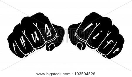 Black color arms with Thug Life tattoo on fingers