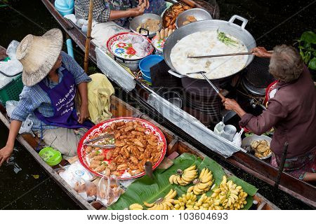 RATCHABURI THAILAND - AUGUST 28: Food boats at Damnoen Saduak floating market on August 28 2010 in R