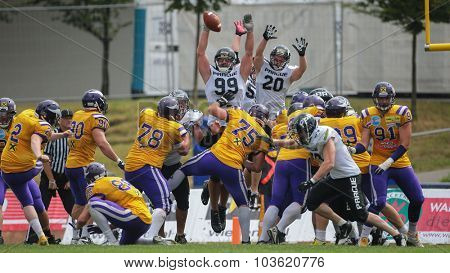 VIENNA, AUSTRIA - JULY 13, 2014: K Christopher Kappel (#2 Vikings) kicks a PAT during an Austrian football league game.