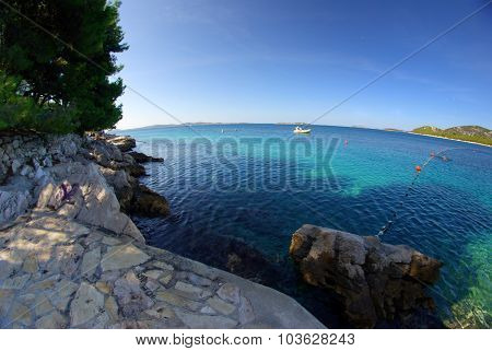 Rocky Beach In The Bay Turquoise Sea, Croatia Dalmatia