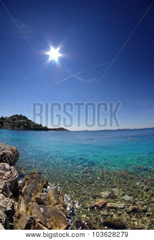 Rocky Beach In The Bay Turquoise Sea, Croatia Dalmatia