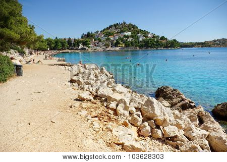 Rocky And Concrete Beach In The Bay Turquoise Sea, Croatia Dalmatia