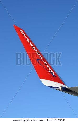 Wingtip with the logo of the airline Norwegian