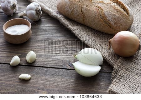 Onions, Garlic And A Loaf Of Bread