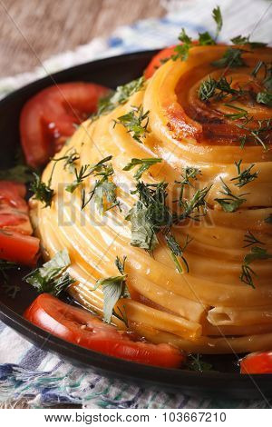 French Timbale Of Pasta Close-up On A Plate. Vertical