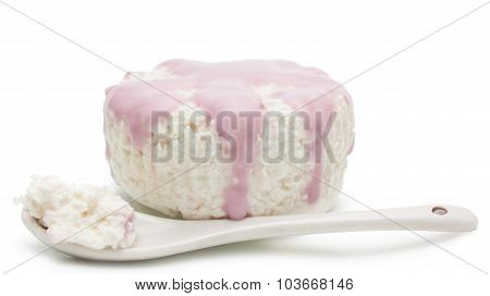 Spoon cottage cheese dessert over white
