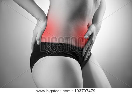 Woman With Abdominal And Back Pain. Pain In The Human Body