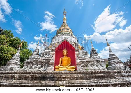White Chedi And Golden Buddha Statue At Wat Buppharam, Chiang Mai