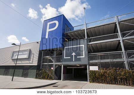 Parking Garage With Blank Billboard