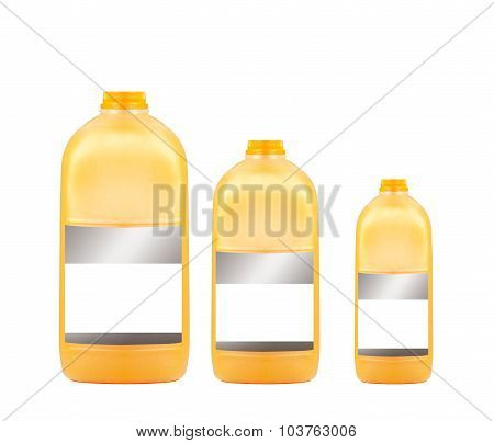 Three orange juice bottles isolated on white background