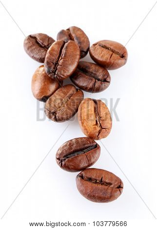 Brown coffee beans isolated on white