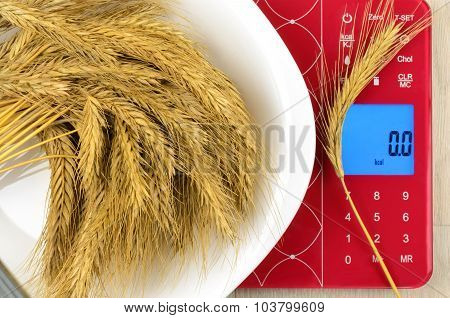Dish Of Cereals On Electronic Kitchen Scales