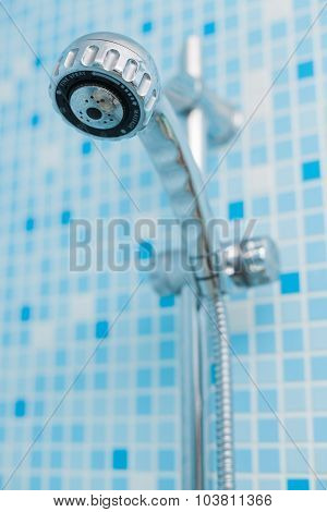 Head shower on blue background