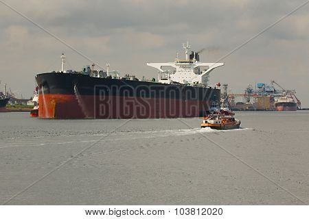 Large crude oil tanker ship coming into port