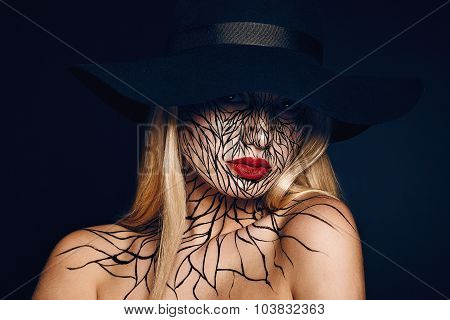 fashion portrait of girl with faceart