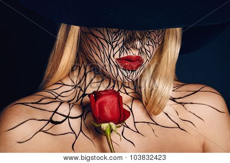 fashion portrait of girl with faceart