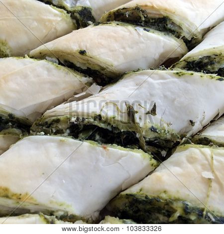 Spinach and Cheese Bourekas close up texture. Food background