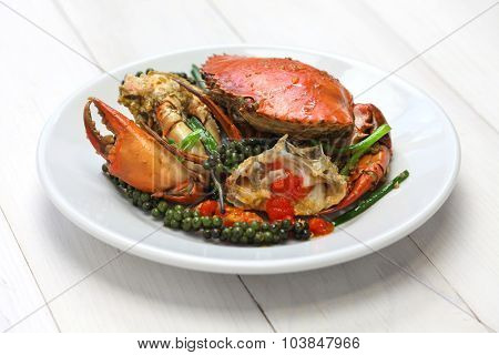 stir-fried crab with green kampot pepper, cambodian cuisine