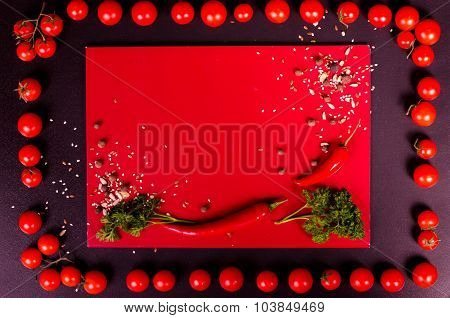 Fresh vegetables on a black table. Autumn background.