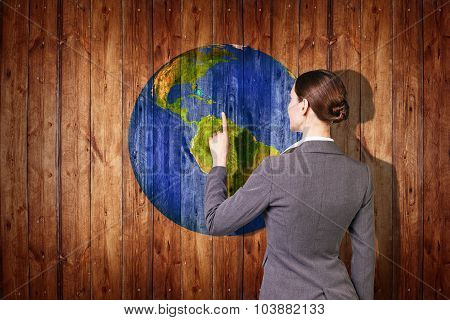 Earth  ball texture on  wood background