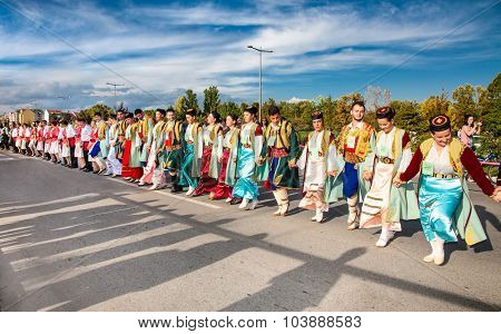 NOVI SAD, SERBIA-OCT 4, 2015: Guinness World Record Largest Folk Dance on Oct 4. 2015 in Novi Sad, Serbia. Over 12.000 participants break the Guinness World Record by simultaneously dancing a Kolo