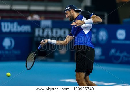 KUALA LUMPUR, MALAYSIA - SEPTEMBER 26, 2015: Luca Vanni of Italy plays his qualifying match in the Malaysian Open 2015 Tennis tournament held at the Putra Stadium, Malaysia.