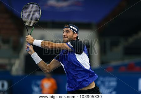 KUALA LUMPUR, MALAYSIA - SEPTEMBER 26, 2015: Luca Vanni of Italy plays his qualifying match in the Malaysian Open 2015 Tennis tournament held at the Putra Stadium, Malaysia.