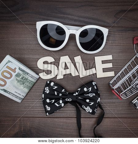 sale concept on the wooden background