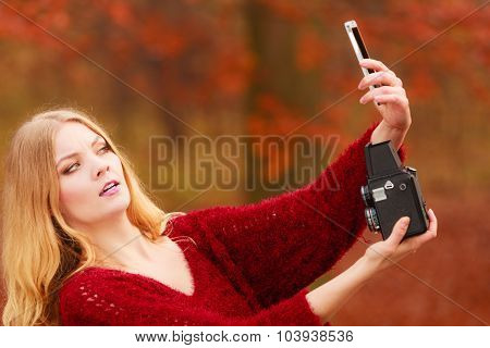 Woman With Camera And Smartphone Take Selfie Photo