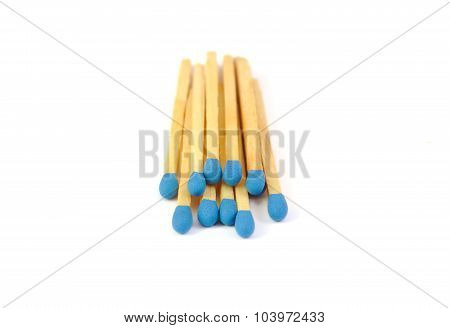 Bunch matches with blue tips isolated on a white background